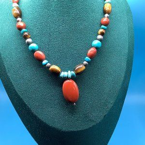 Vintage Carolyn Pollack Relios necklace made up of turquoise and red Jasper